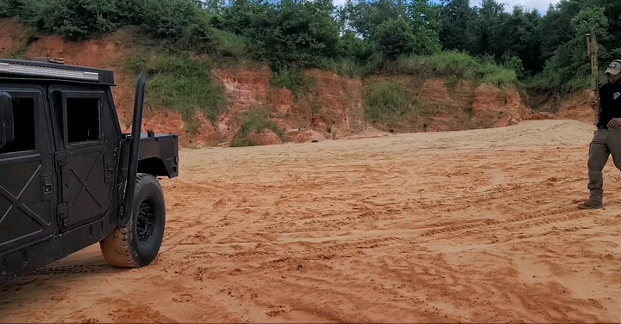 HANGING UPSIDE DOWN SHOOTING THE BARETT M107A1 50CAL