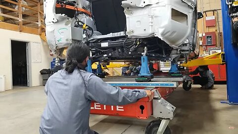 Tesla model Y on Celette Sevenne bench with Universal fixtures system CAMELEON