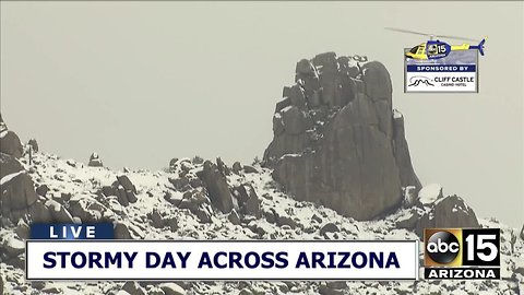 PRETTY! Snow covers Tom's Thumb in the McDowell Mountains