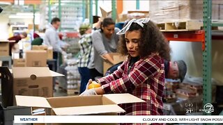 Metro Caring providing families with food boxes