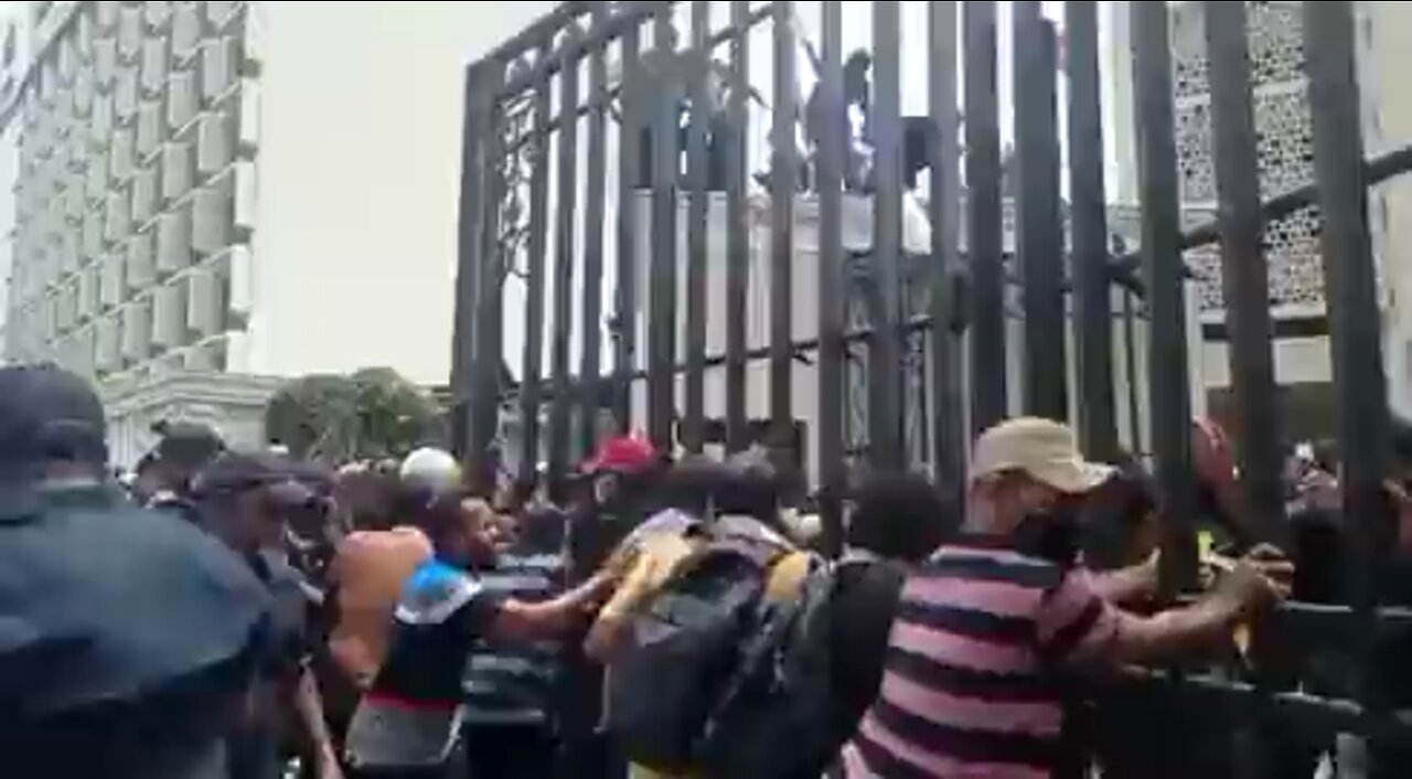 Protesters broke through the front gate of Sri Lanka's Central Bank...