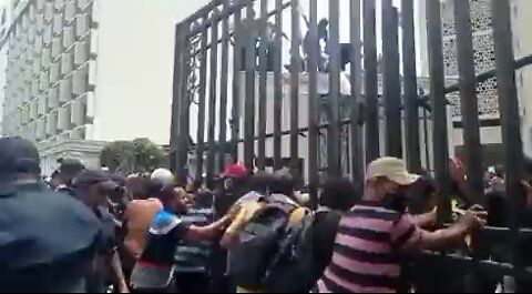 Protesters broke through the front gate of Sri Lanka's Central Bank...