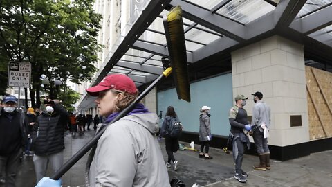 Volunteers Clean Up Damage Following Protests