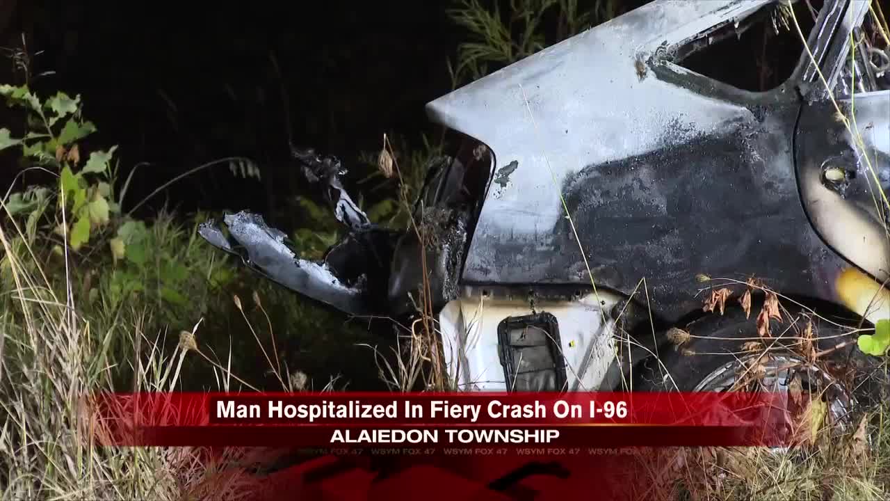 Man fell asleep behind wheel, flips car in fiery I-96 crash