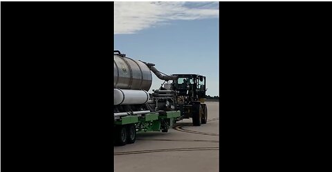 Modular Airborne Firefighting System Tank Loads Into a 302nd Airlift Wing C-130