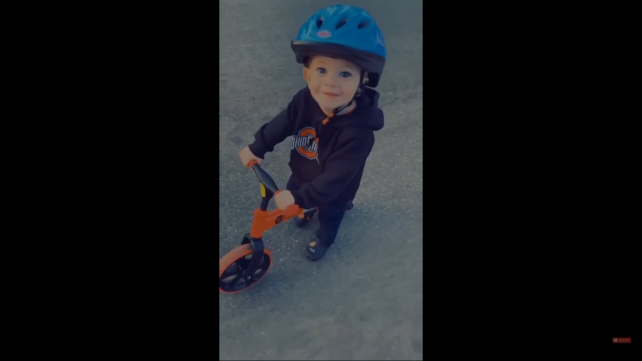 Very Cute Kid riding his bike and stealing hearts