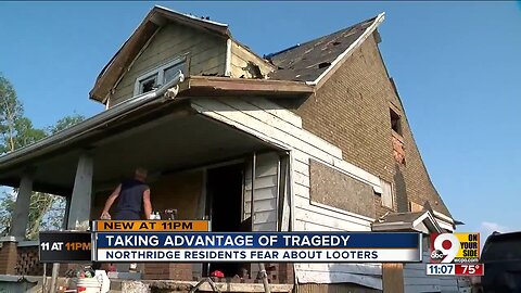 Afraid of looters, tornado victims camp out in ruined homes