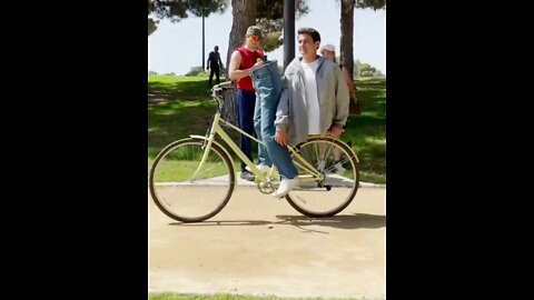 MAN CUT IN HALF ON A BIKE