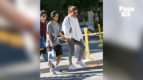 Jennifer Lopez sweetly holds 15-year-old Emme's hand during LA flea market outing
