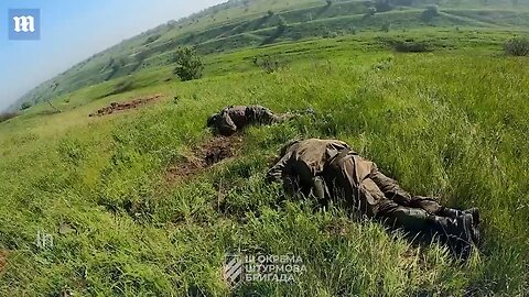 Ukrainian soldiers assault Russian trenches