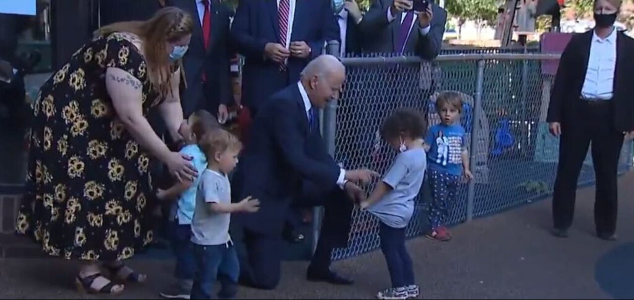 Biden Says ‘I Like Kids Better Than People’ After Hugging Child Maskless, While Hecklers Nearby Shou