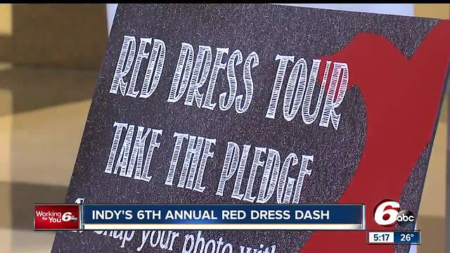 Women and men in red made their way around Monument Circle to raise awareness about women's heart health