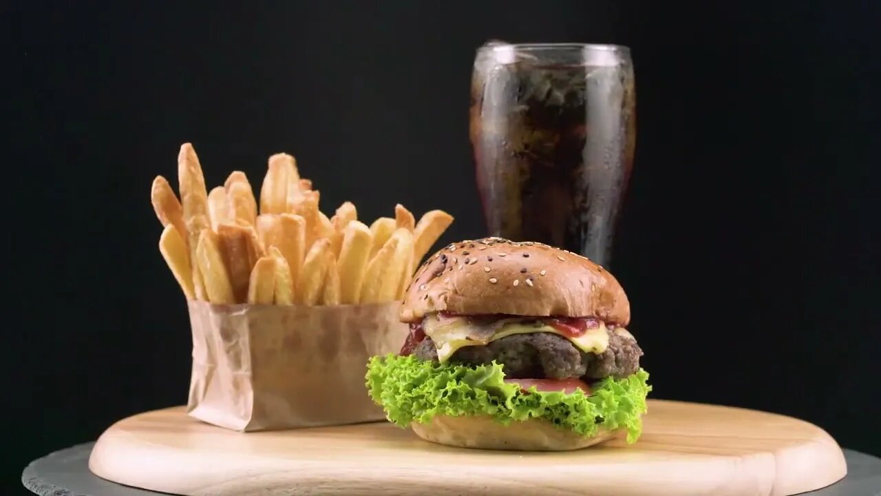 Hamburger with French fries and soda