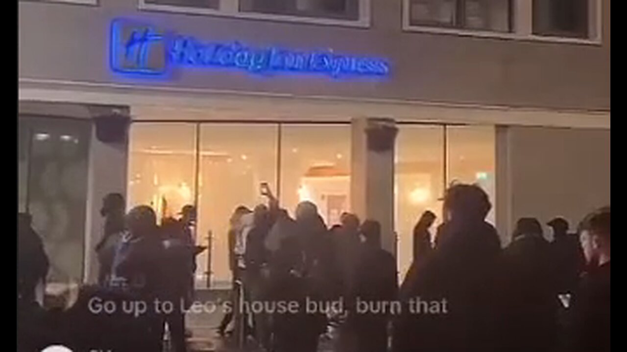 Holiday Inn that's housing invaders in Dublin burning