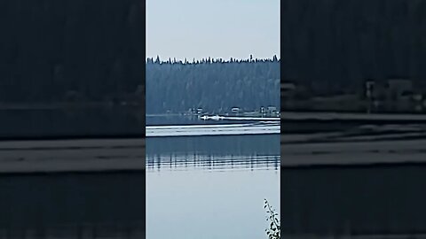 family enjoying waterskiing on Chimney Lake BC #travel #waterskiing #camping