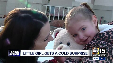 Two-year-old girl gets snowy surprise from the Casa Grande police!