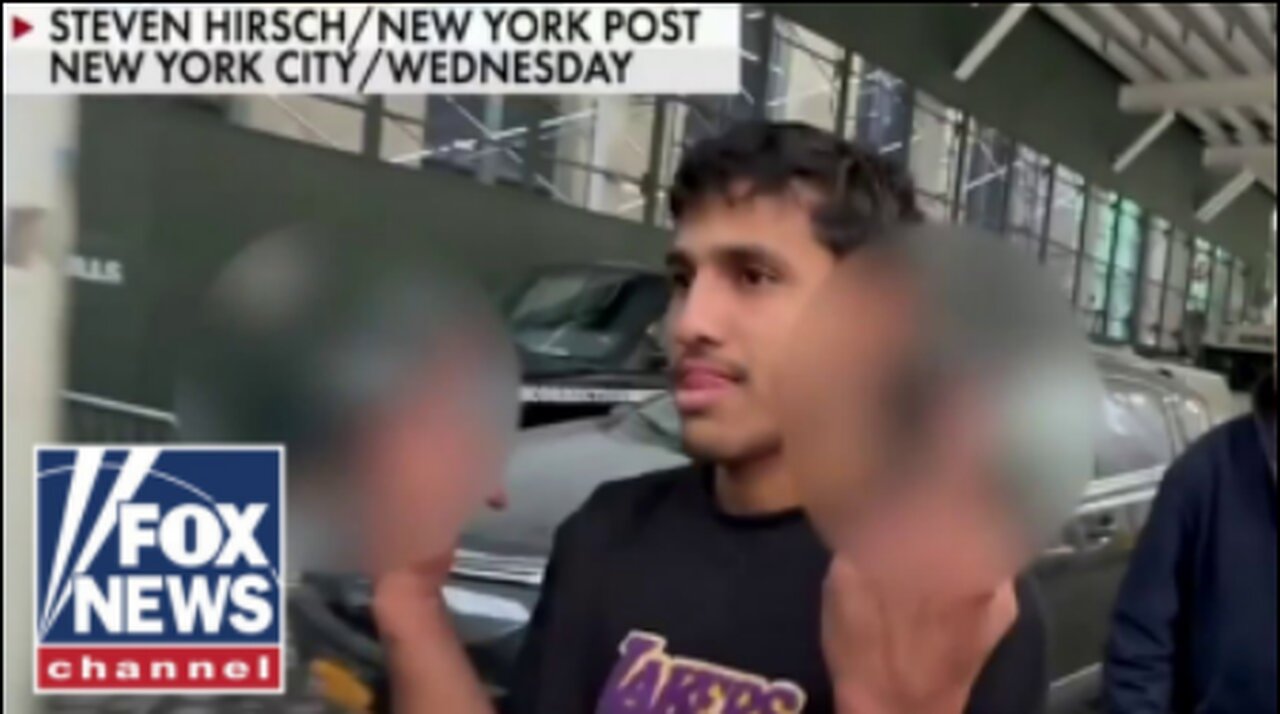 Illegal migrants in violent NYPD attack give middle finger after release