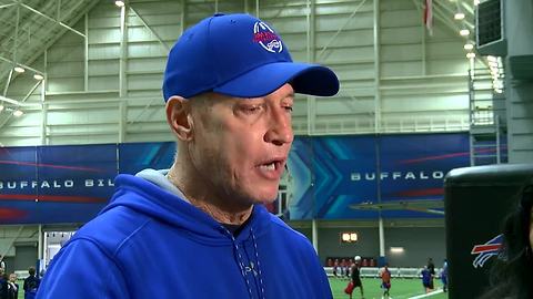 Jim Kelly talks at his annual football camp