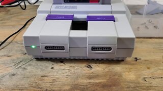 Modding my SNES with a color changing LED.