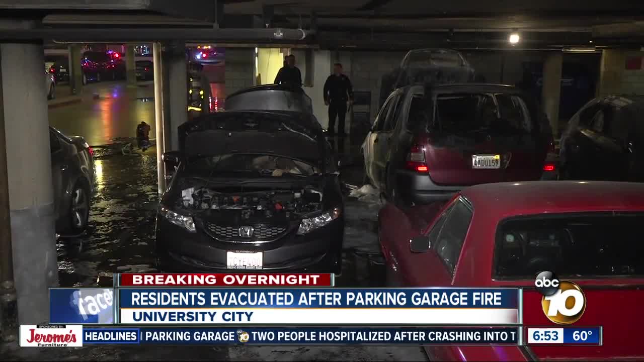 Fire burns vehicles in parking garage at University City apartment complex