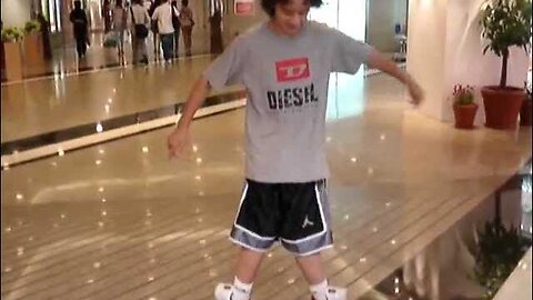 Kid With the Retarded Legs...Silly Leg Twist Ballerina Move in New Running Shoes Video