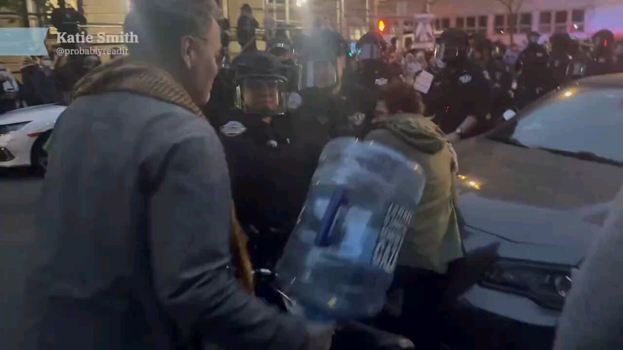 Pro Hamas rioter hits police with a water jug instantly arrested.