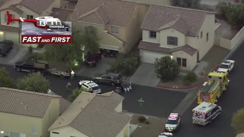 Police surround neighborhood near Sahara, Sloan