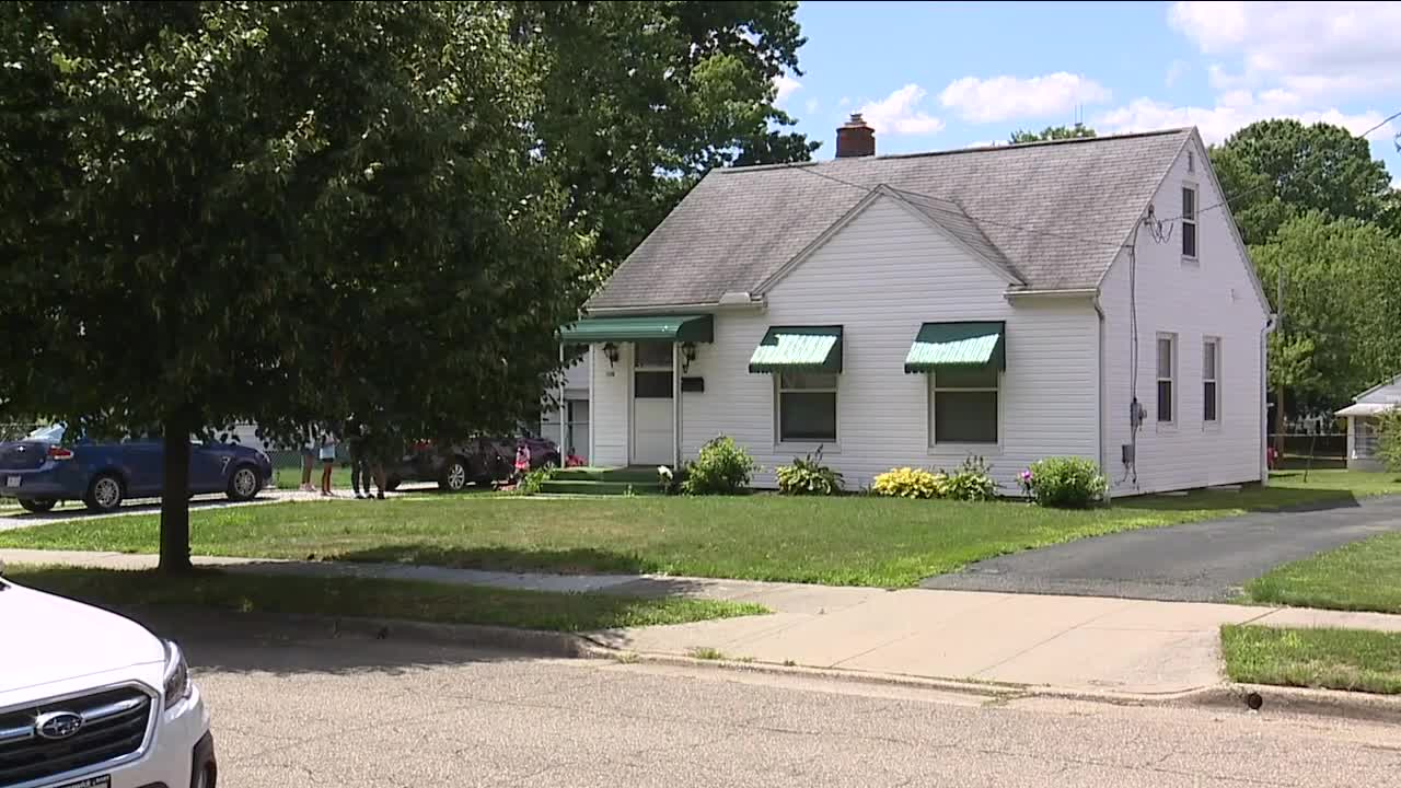 Akron mother scared after bullet blasts through home