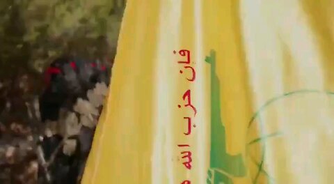 Hezbullah releasing a video, switching green to red (war) headbands, preparing to invade Israel