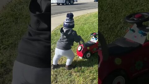 Toddler takes car suburban off roading