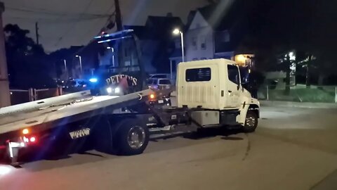 Boston police Towing dirt bike after it was involved in a accident