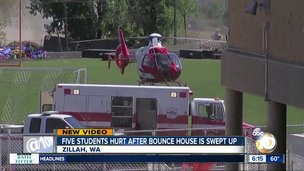 Video shows bounce house flipped by strong wind