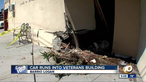 Car runs into veterans building