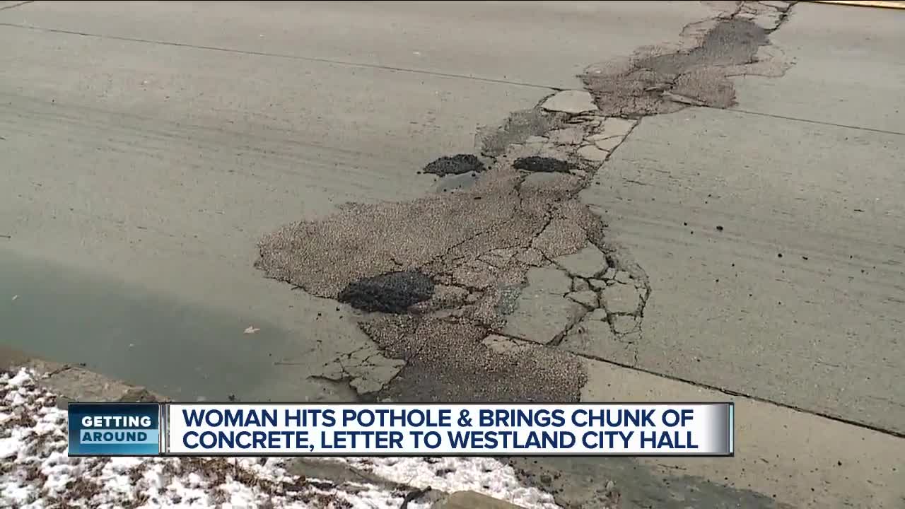 Frustrated driver brings chunk of concrete to Westland city hall