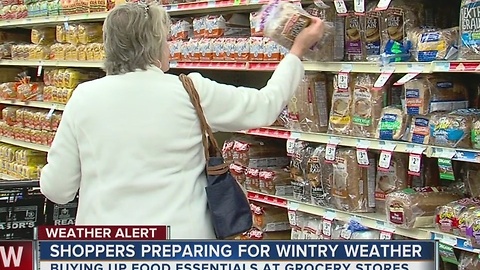 Rush to stock up on food as winter storm nears