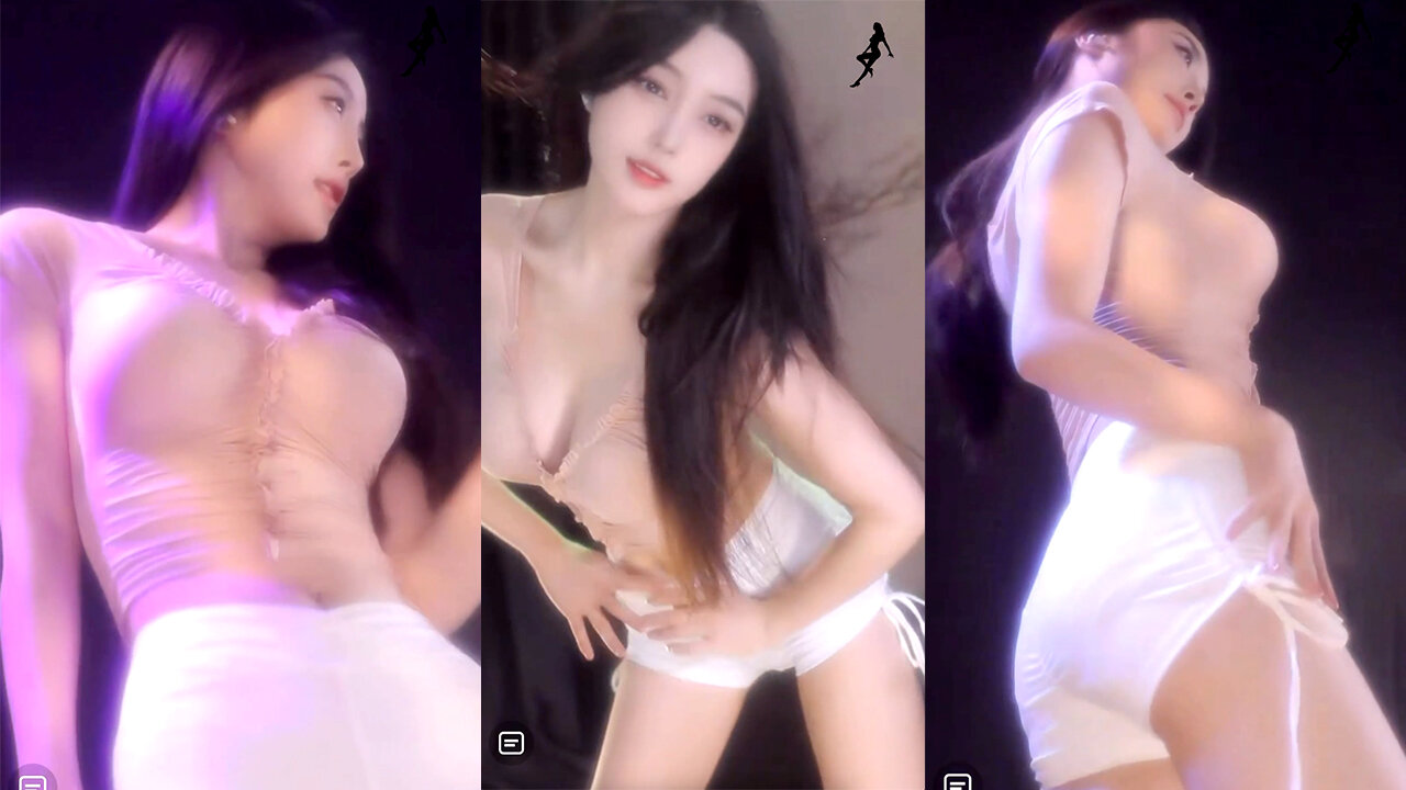 Sensual dance streamer captivates in form-fitting hot pants and a tight top, showcasing her curves and moves