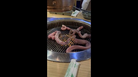 Sharp-toothed eel being cooked