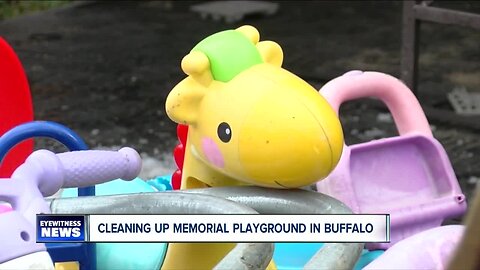 Helping clean up after vandals hit a playground