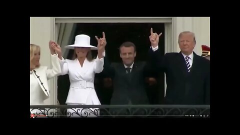 Trump & Melania hold hands through Emmanuel Macron - Who has to make devil horns.