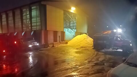 trucks loading up with salt to treat the roads