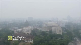 A think haze sits over Winnipeg as wildfire smoke pushes across the province