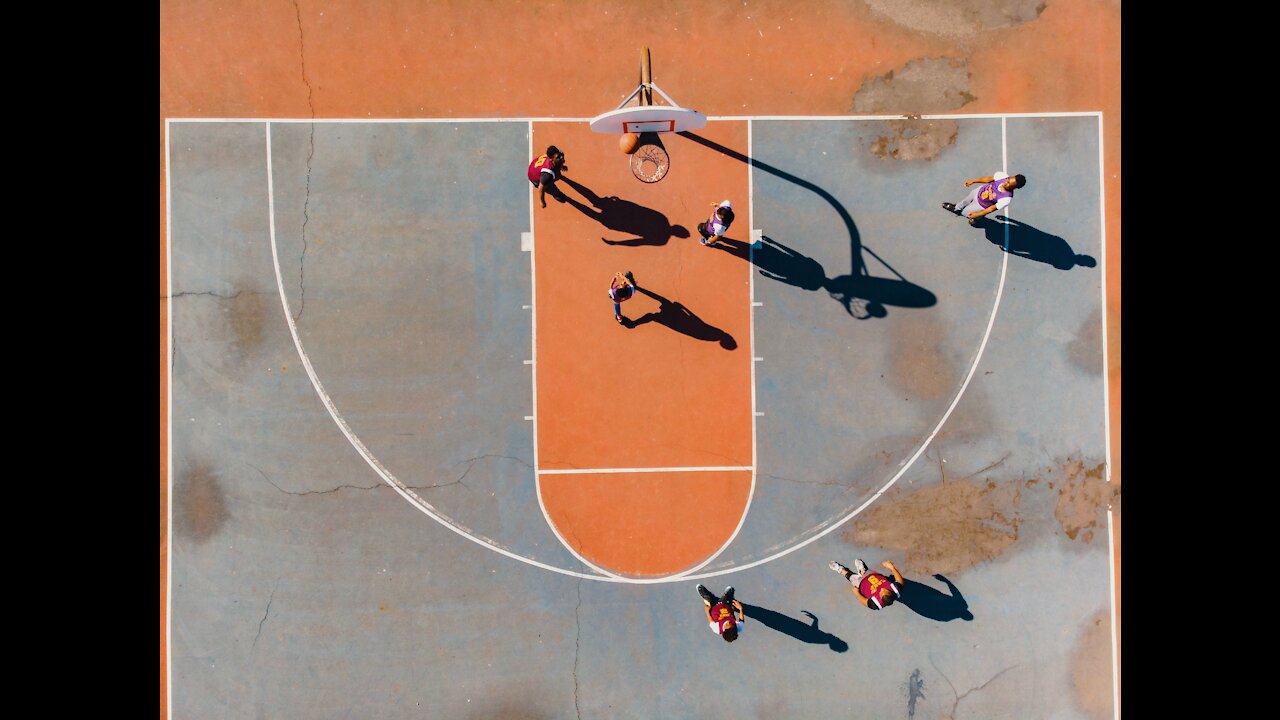 A boy throws the basketball into the basket and ends up entering the basket too đđâšī¸