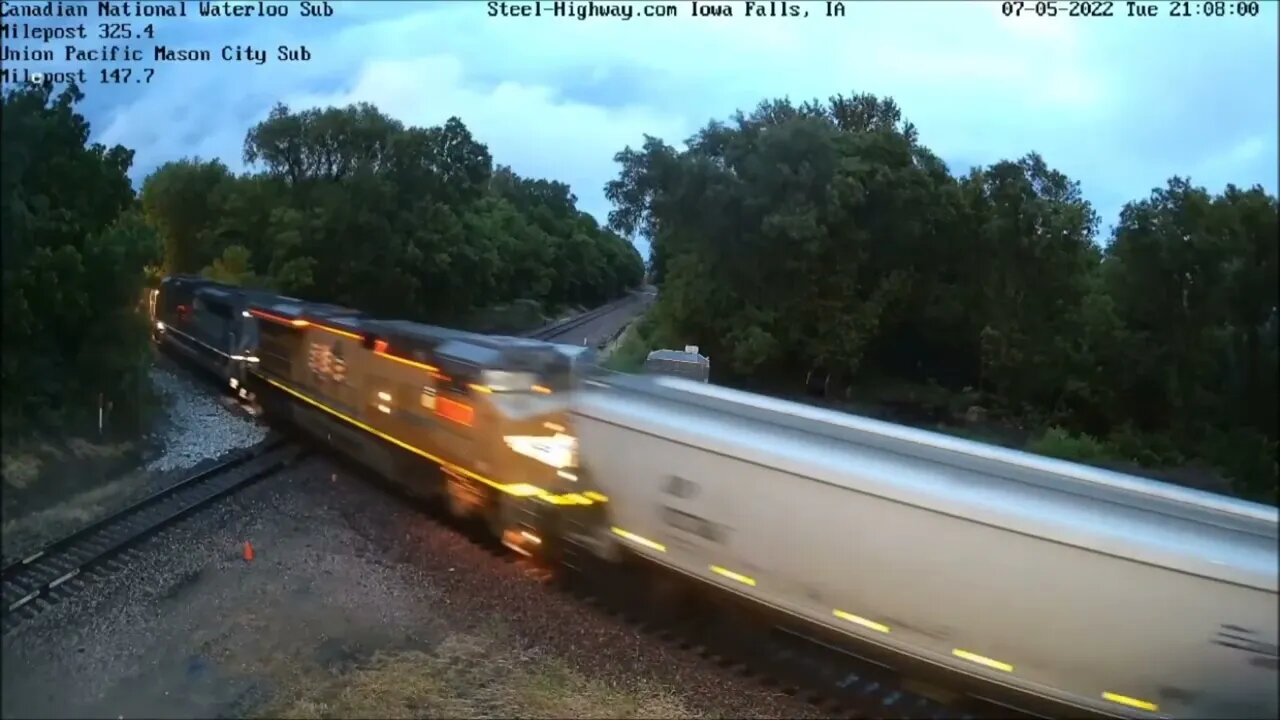 UP 1983 Leading EB then NB UP Grain at Carroll, IA and Mills Tower in Iowa Falls, IA on July 5, 2022