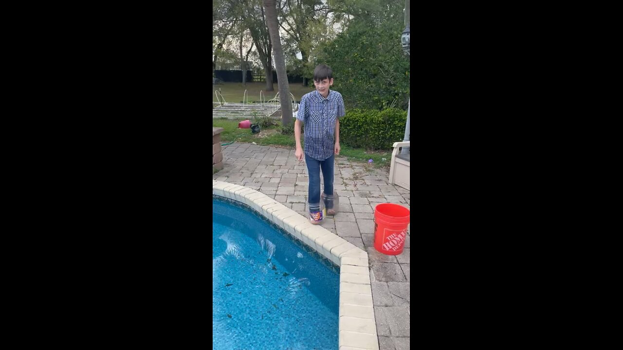 Dummy tries to run on water with buckets