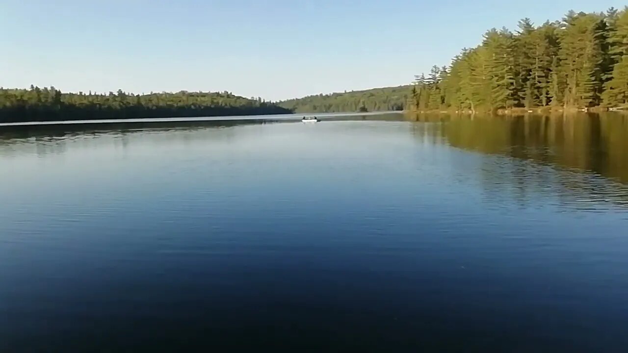 It's camping season! Fishing in a leaky boat on a calm lake. #camping #fishing #funtimes #leaking