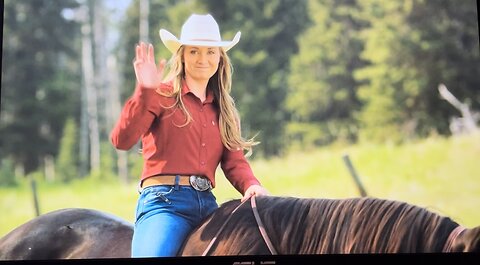 Heartland 17X03 Amy waves to Nathan Pryce Jr. in the field