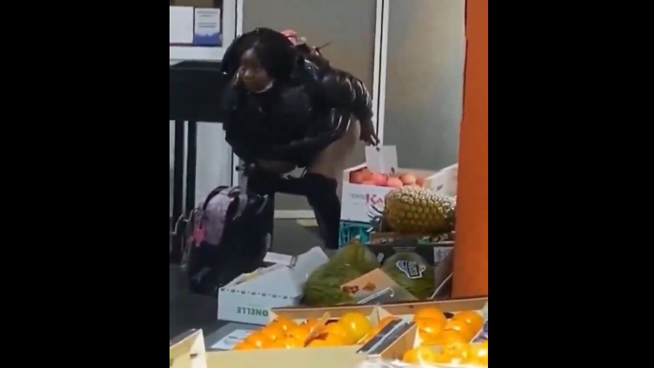 Black woman takes a crap in the middle of a grocery store