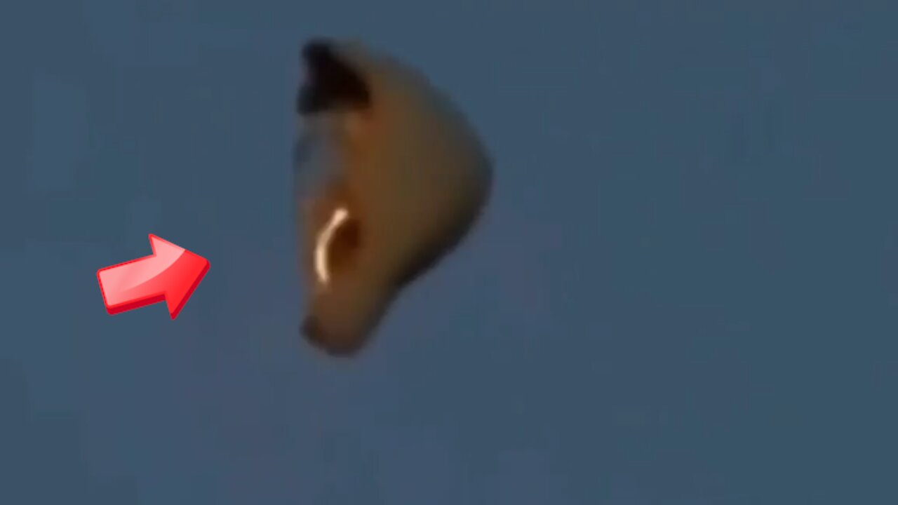 Sighting of a brown half-moon shaped explorer (UFO?) in the sky above [Space]