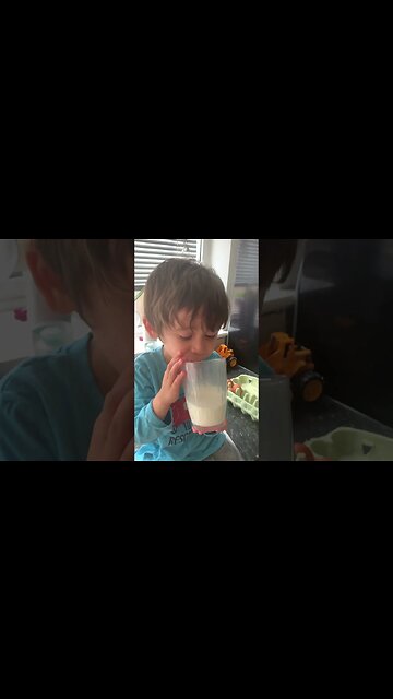 My cute baby boy is drinking his milk