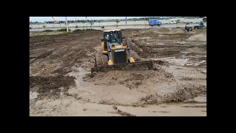 Great mighty bulldozer Shantui Clearing Muddy